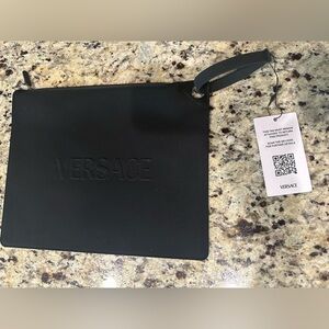 Versace black swim pouch - never used